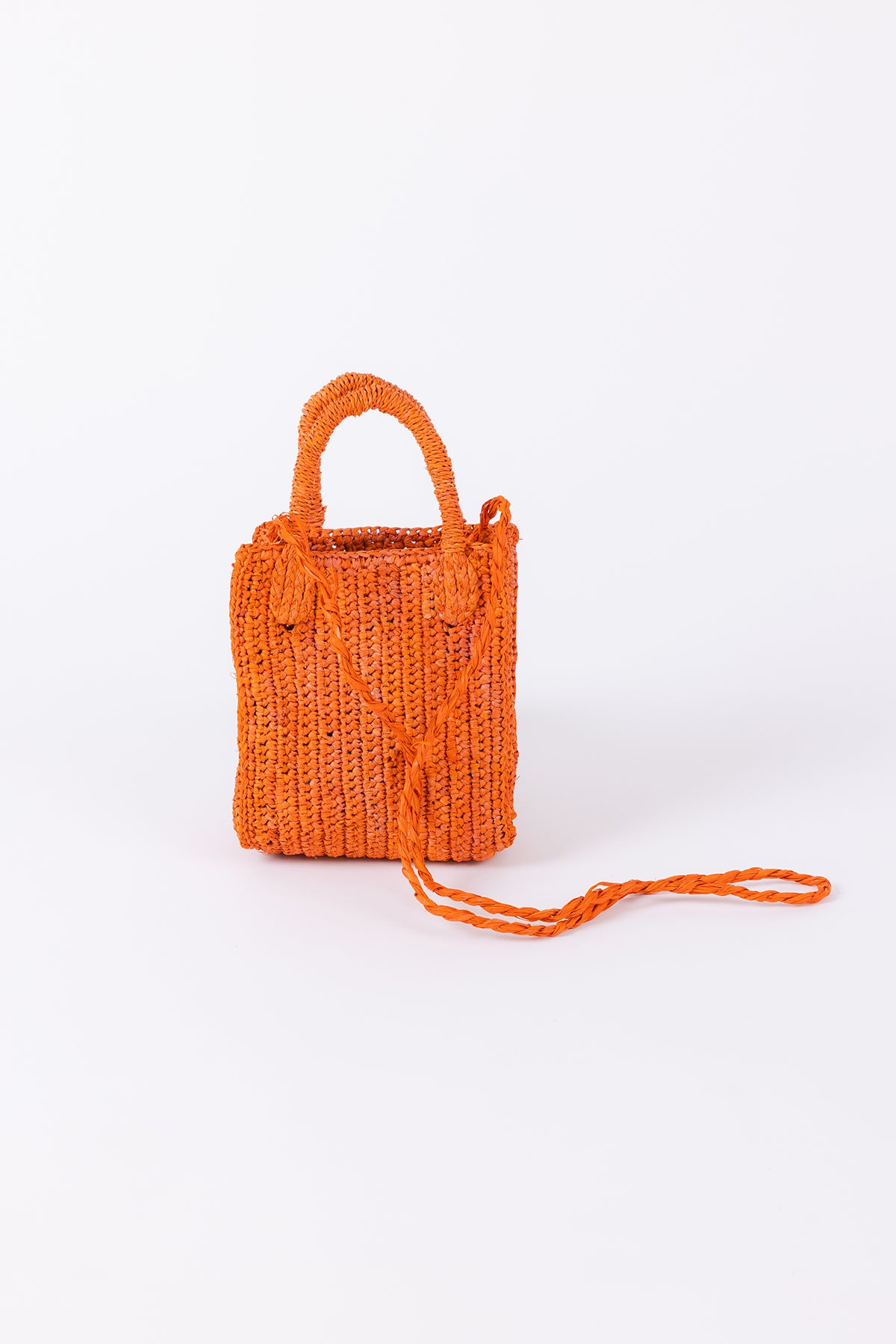MIMI RAFFIA CROSSBODY handbag with a strap on a white background, featuring vibrant colors by Velvet by Graham & Spencer.-26047808045249