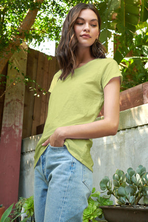 Tilly original slub crew neck tee in citron model standing outside with hand in jean pocket