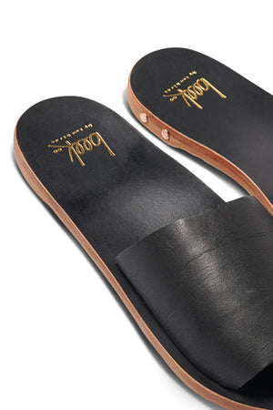 a pair of black leather Mockingbird sandals by Beek.