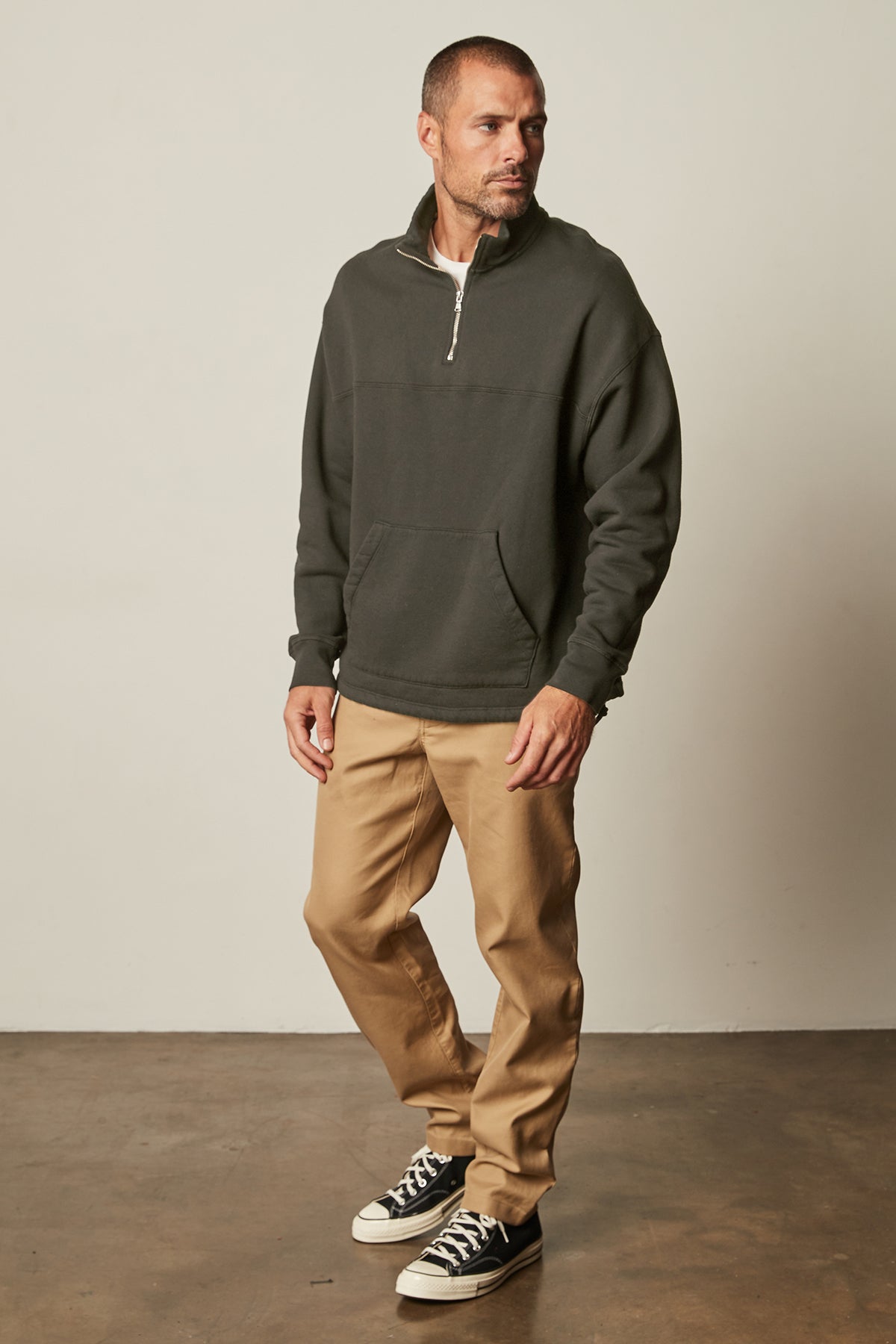 Baldwin Quarter-Zip Sweatshirt in dillweed front with khaki Aiden pants and Converse full length front-25601315569857