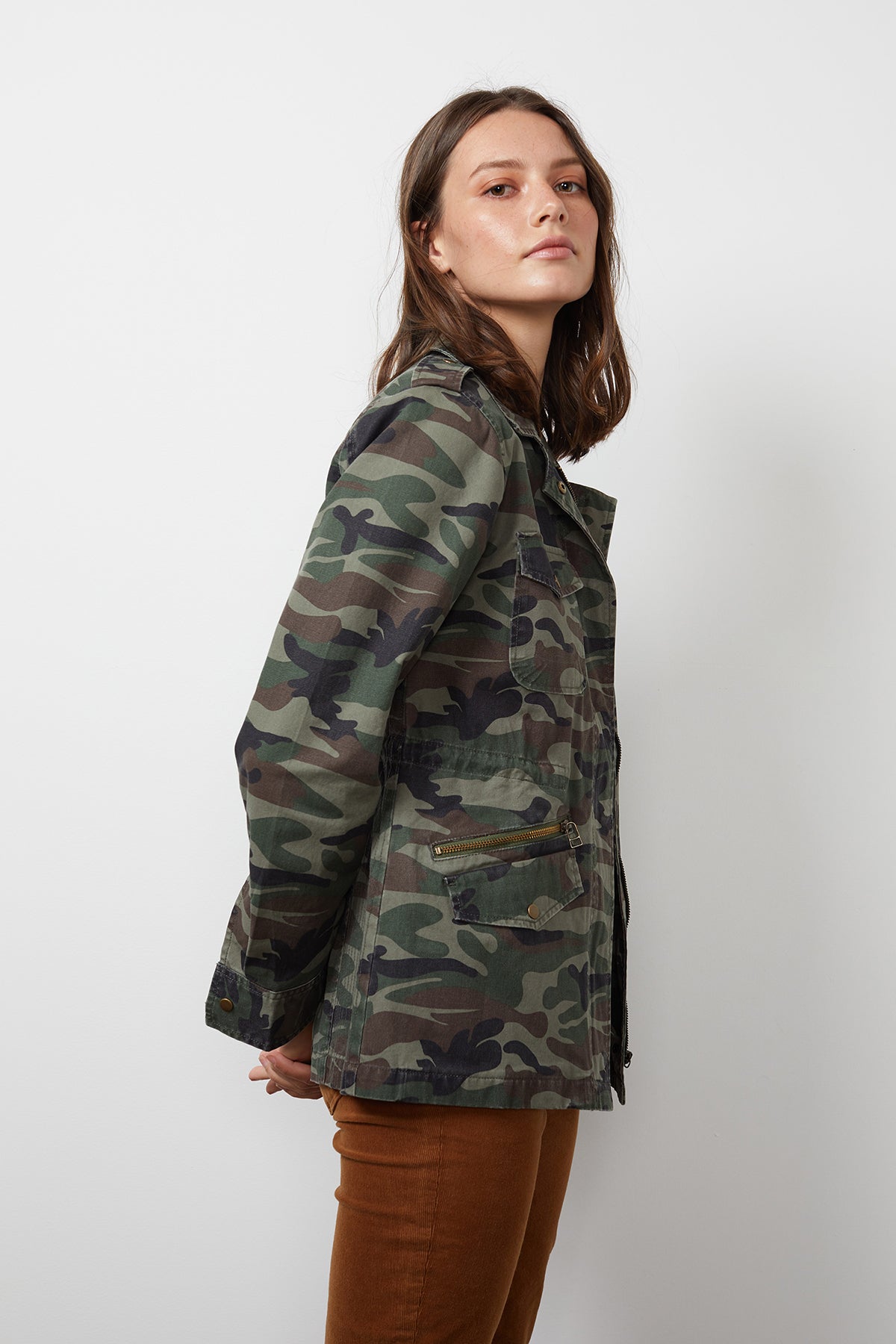   a woman wearing a Velvet by Graham & Spencer RUBY LIGHT-WEIGHT ARMY JACKET. 
