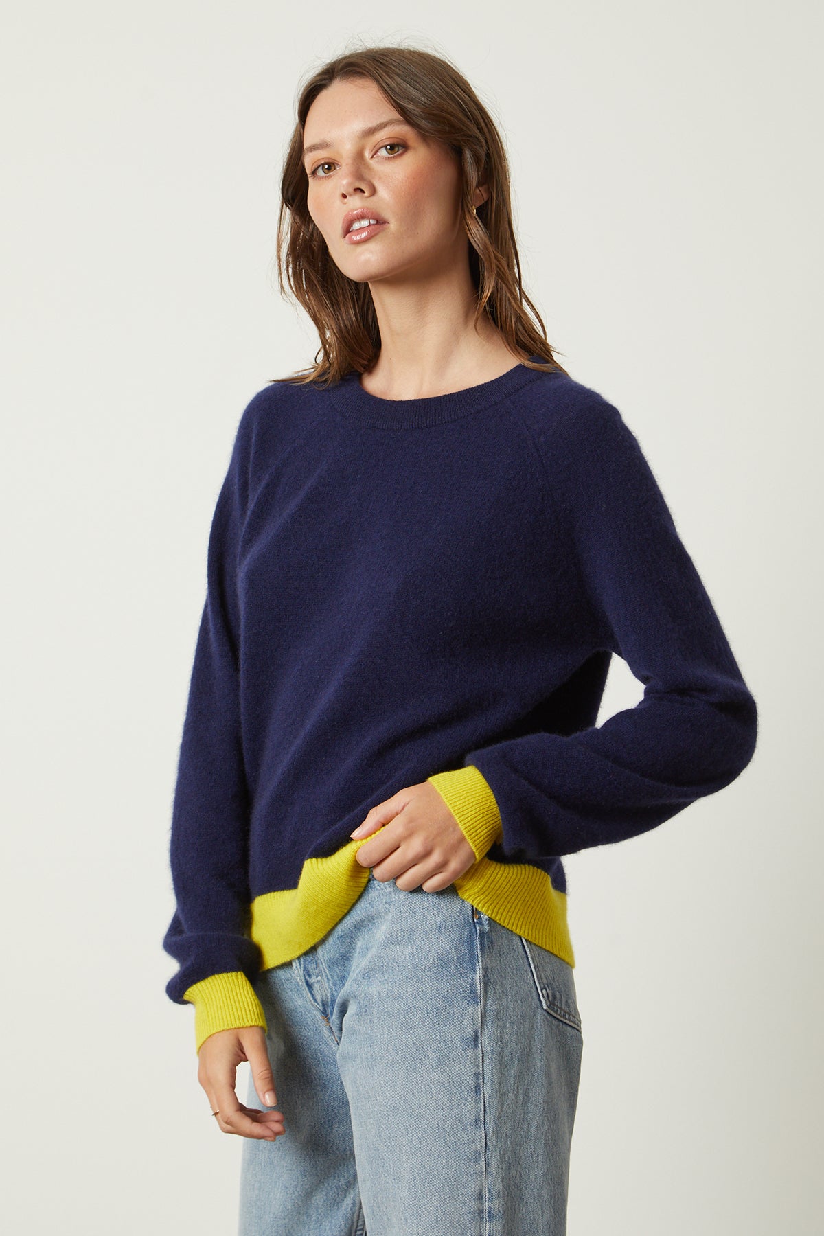   Claire Sweater in navy with yellow contrast at the cuffs and hemline with blue denim side & front 