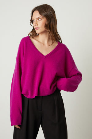 Amika Cashmere V-Neck Sweater in bright magenta pink with Leona pant front