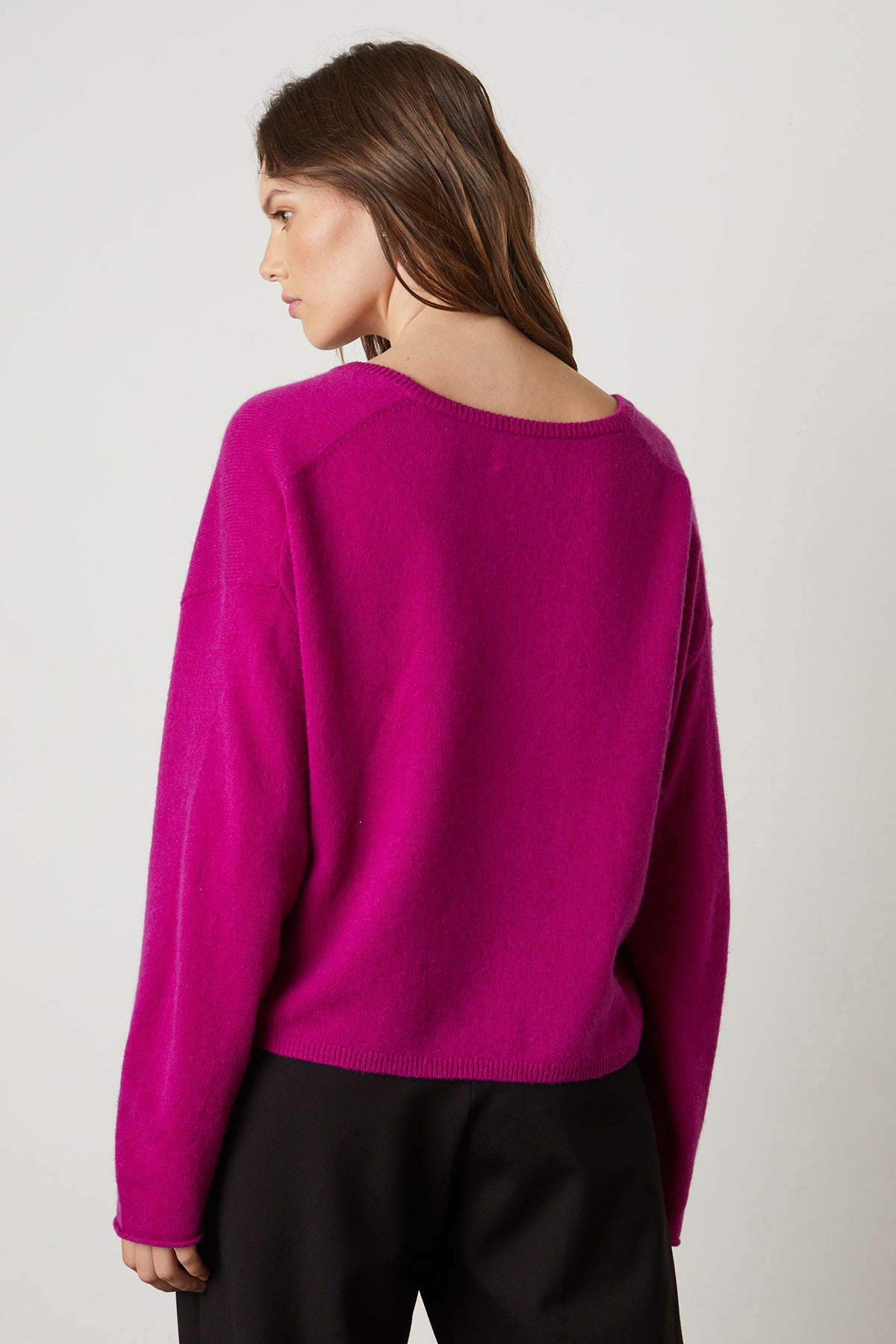   Amika Cashmere V-Neck Sweater in bright magenta pink with Leona pant back 