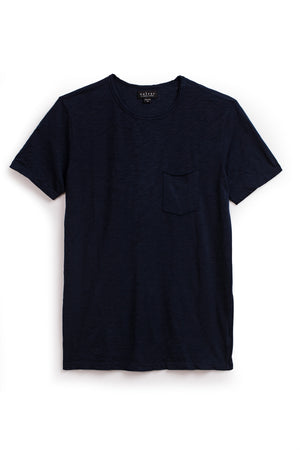 Plain dark blue Chad Tee with a crew neck and a small pocket on the left chest, crafted from textured cotton slub, displayed against a white background by Velvet by Graham & Spencer.