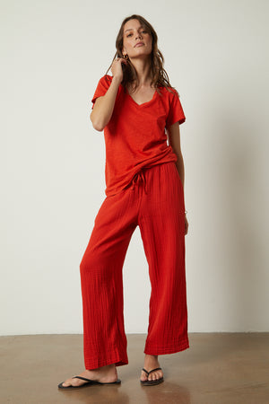 A woman wearing Velvet by Graham & Spencer FRANNY COTTON GAUZE PANT with Lilith Tee 
