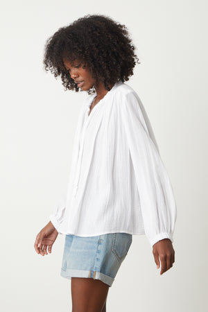 Kathleen V-Neck Top in white gauze with denim shorts side