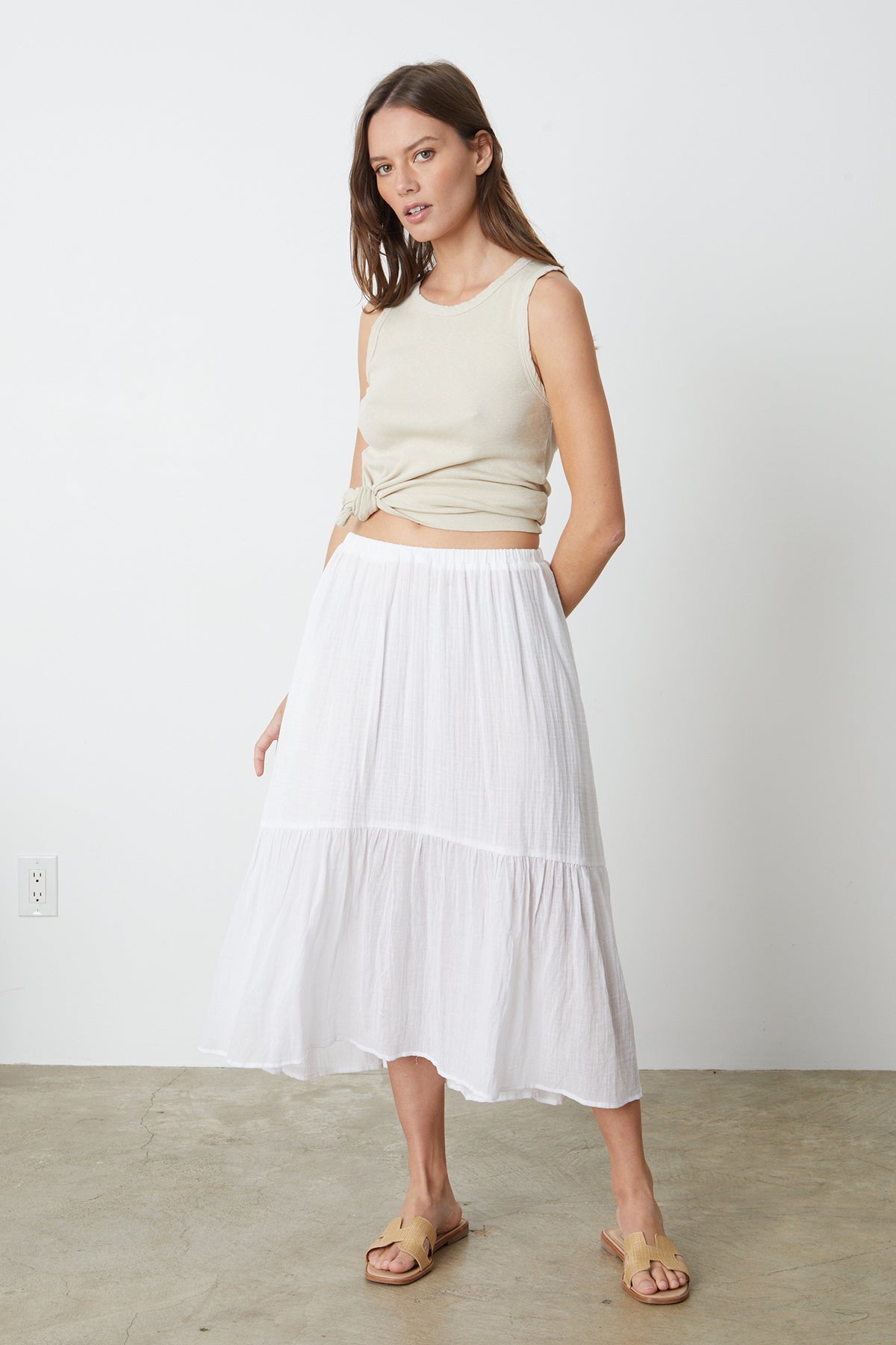   Mckenna Tiered Skirt in white with Aliza tank in gravel tied with knot to show waist full length front 