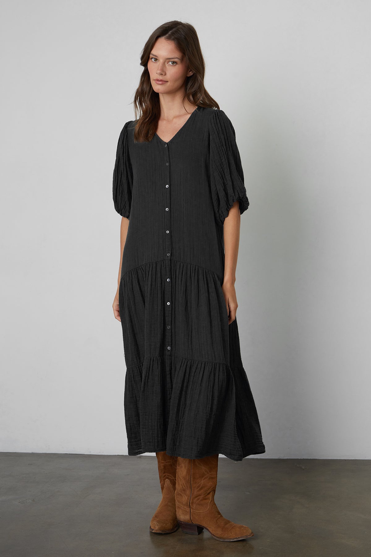   Pauline Cotton Gauze Midi Dress in Black front view with brown boots 