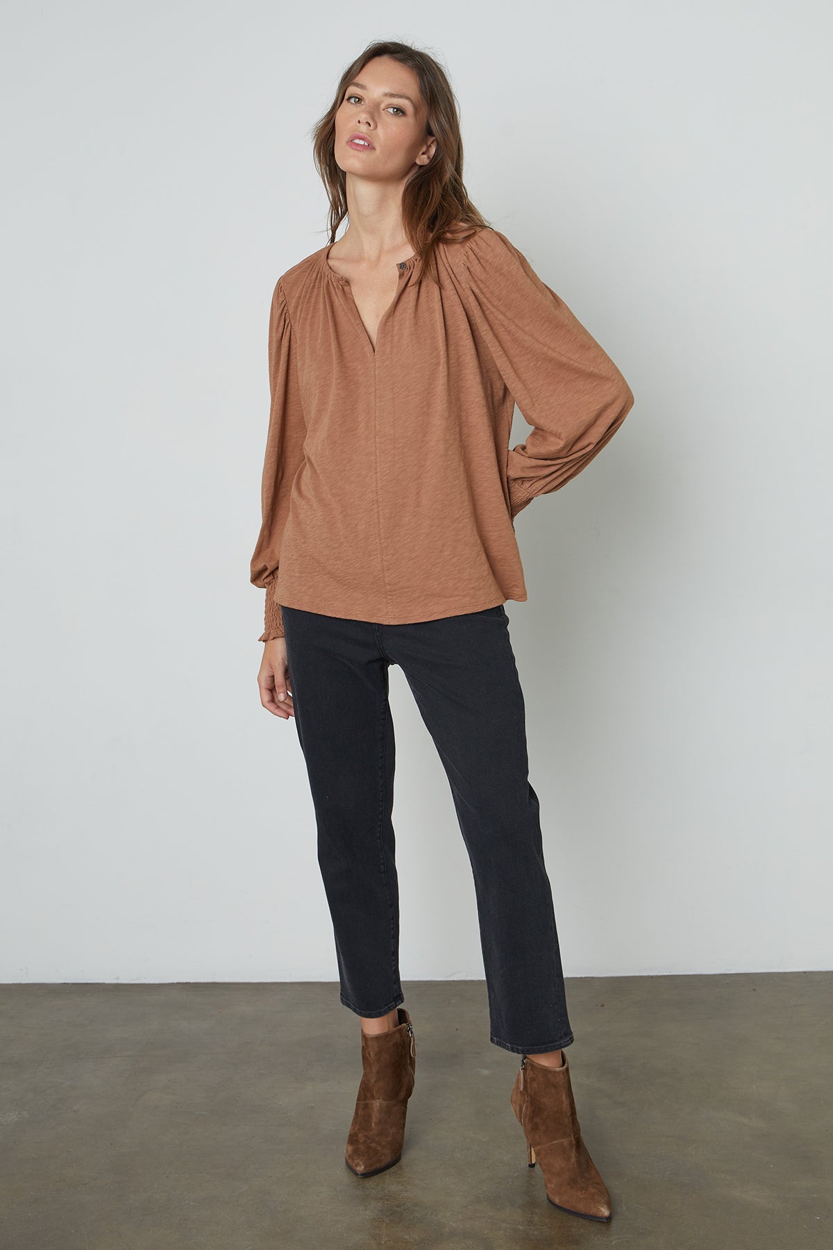  Irina Split Neck Tee in Camel front view with denim and boots 