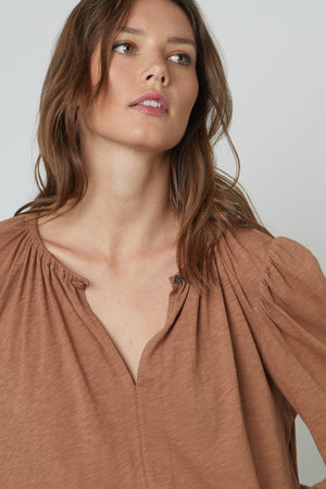 Irina Split Neck Tee in Camel close up front view