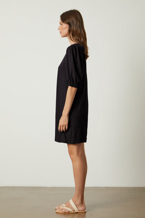 Meghan Dress in black with puff sleeves full length side