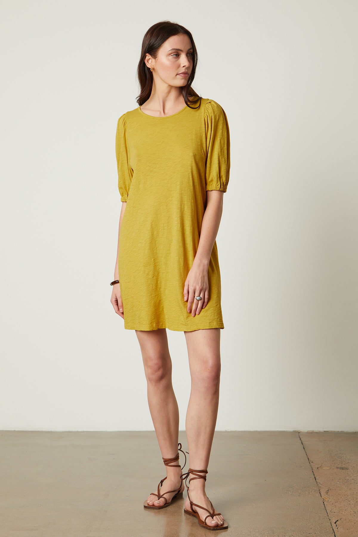   Meghan Dress in buttercup with puff sleeves full length front 