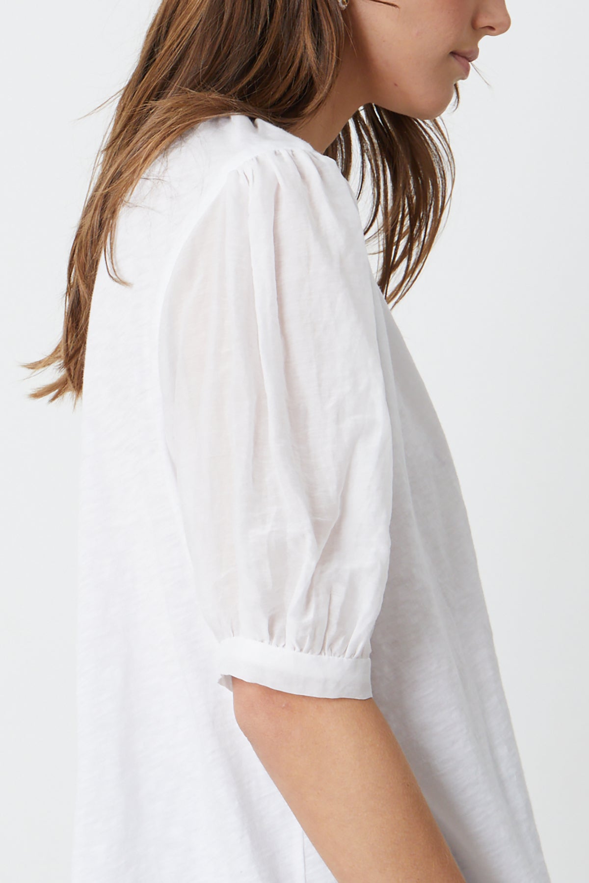   Mallory Top in white side detail with puff sleeve 