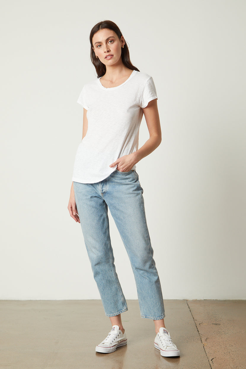 Odelia Cotton Slub Crew Neck Tee in White with blue denim full length