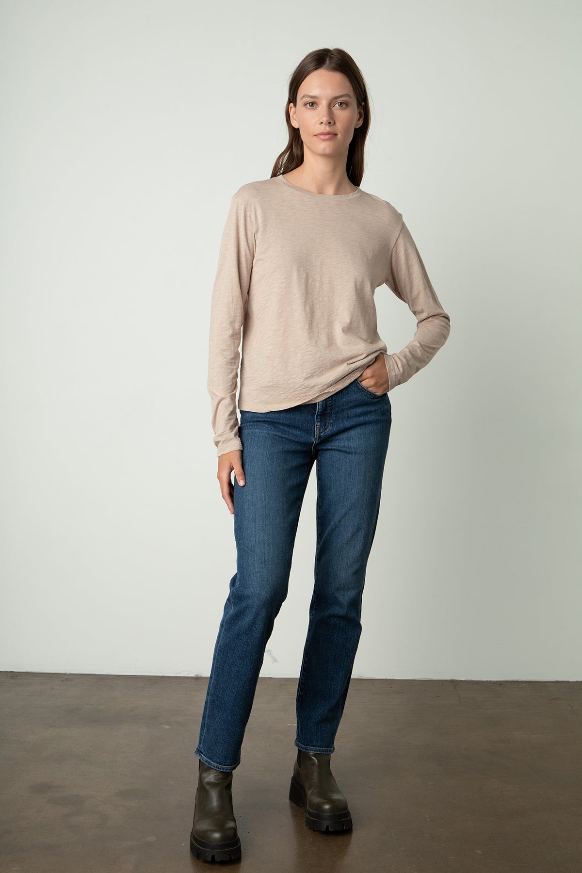 the model is wearing a HESTER CREW NECK TEE and jeans from Velvet by Graham & Spencer.-24532973486273