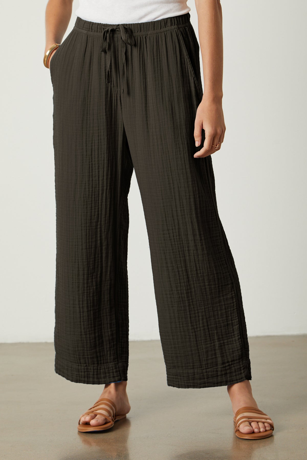 A woman wearing dark brown hedge color Velvet by Graham & Spencer FRANNY COTTON GAUZE PANT front-26143109152961