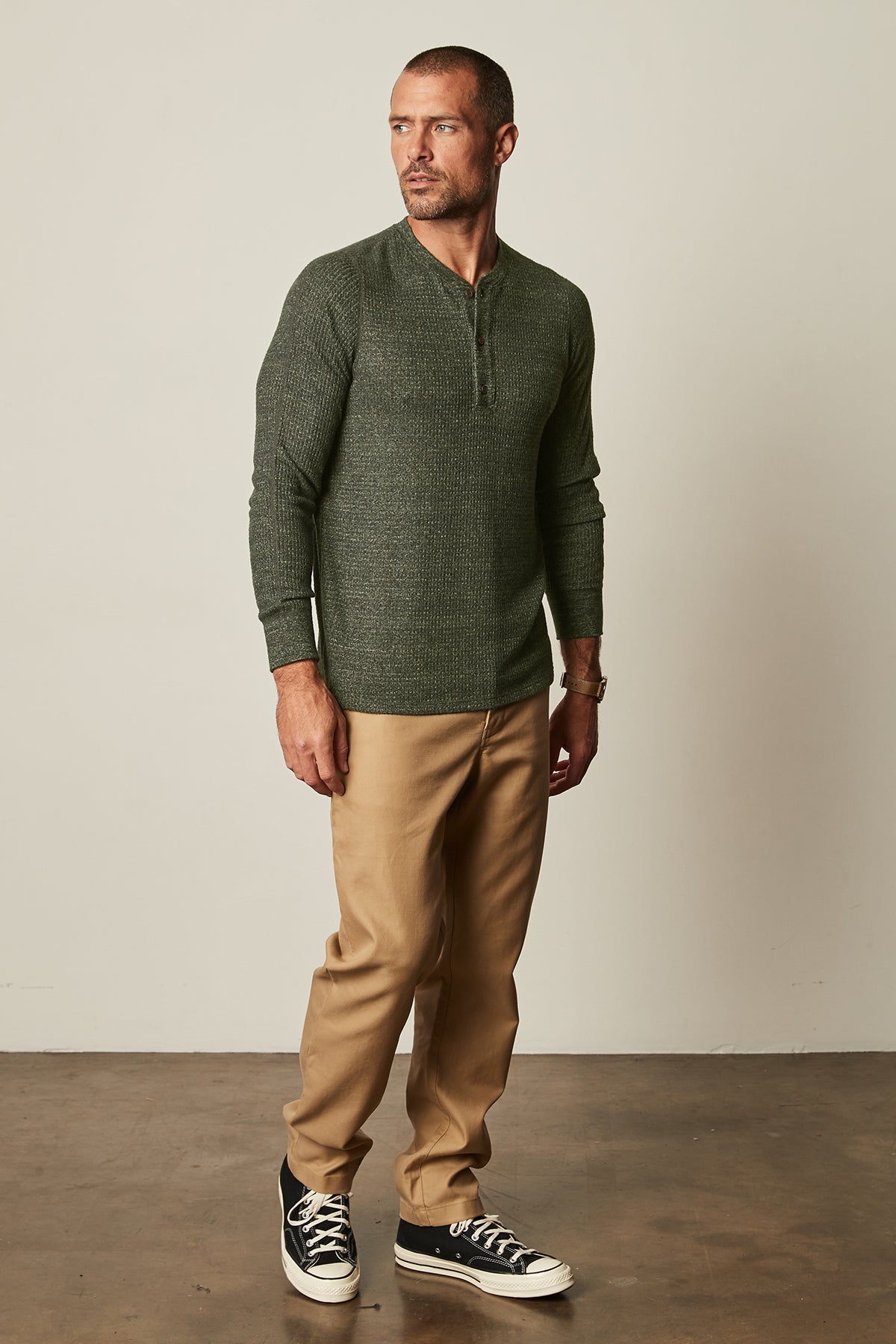   Model standing wearing Anthony Thermal Henley in moss green with Aiden pant in khaki full length front view 