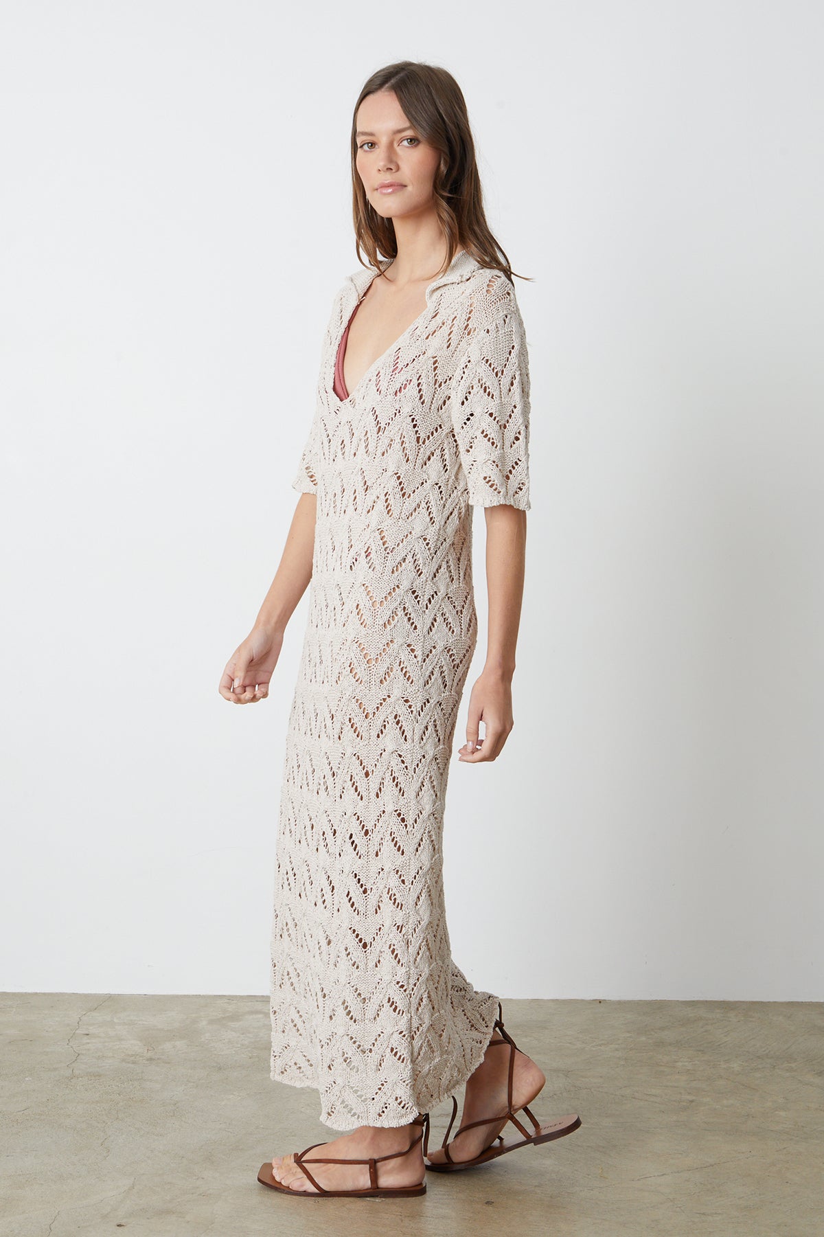 Jacqueline Crochet Stitch Maxi Dress in putty with brown sandals full length side-26296066801857