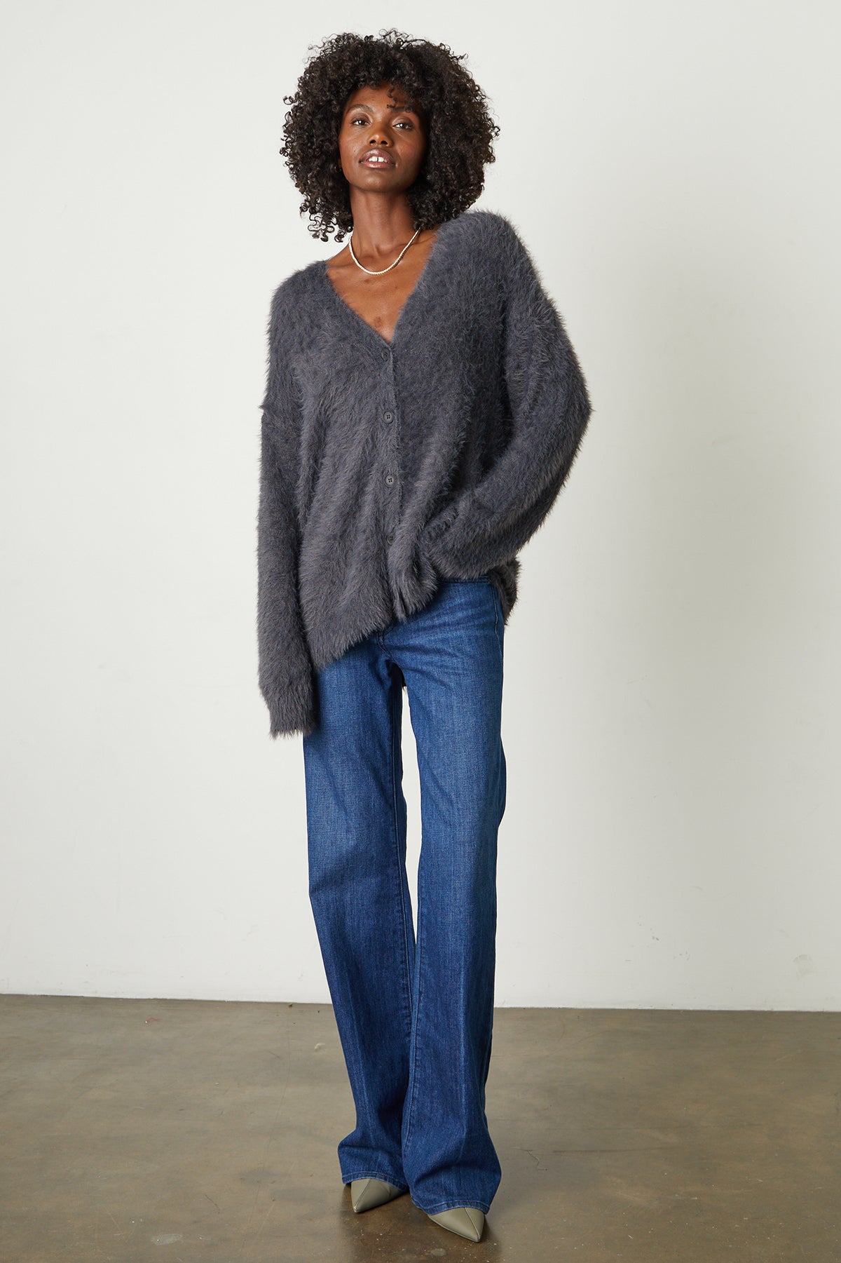 Barb Feather Yarn Button Front Cardigan in charcoal grey with blue denim and heels full length front-25548654969025