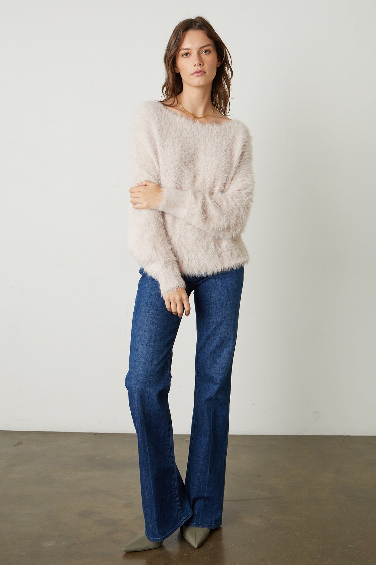 Betty Feather Yarn Boat Neck Sweater in pale blush pink with blue denim and heels full length front-25548650774721