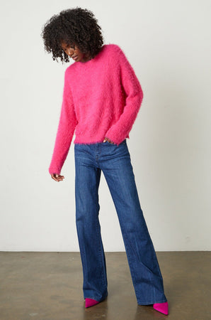 Ray Feather Yarn Crew Neck Sweater in hot pink  with blue denim and hot pink heels full length