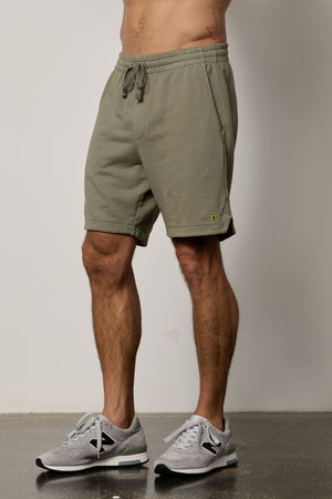 Kane short in camp muted green french terry side & front