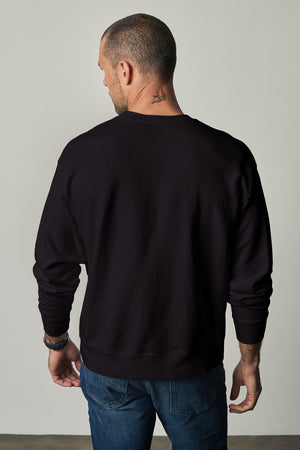 Sirus Crew Neck Sweatshirt in black with blue denim back
