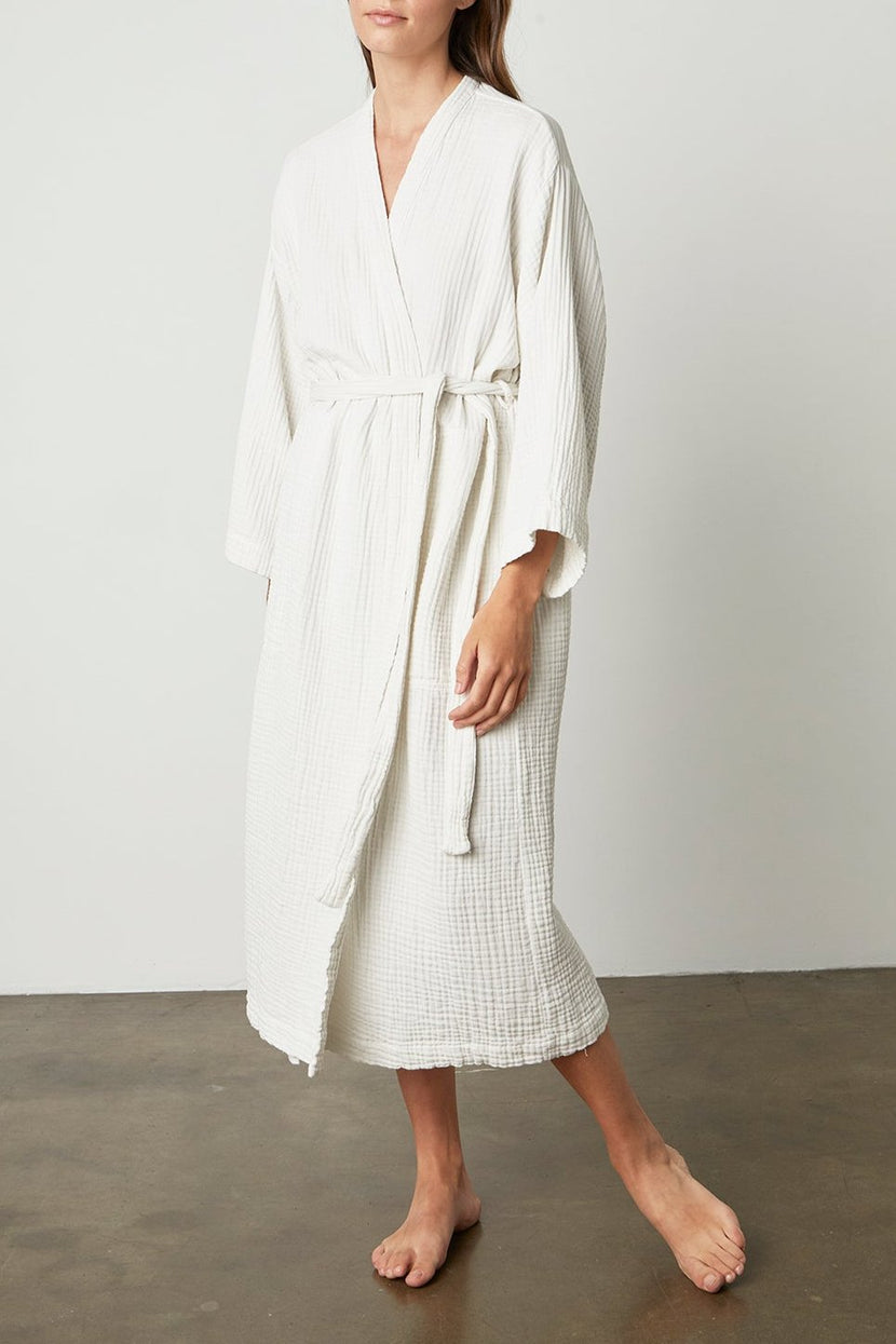 a woman wearing a Jenny Graham Home Cotton Gauze Robe.