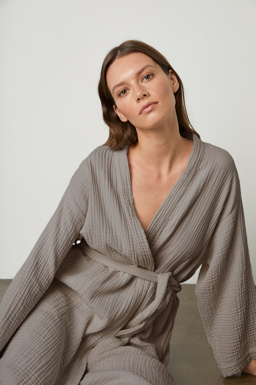 The model is wearing a Jenny Graham Home COTTON GAUZE ROBE.