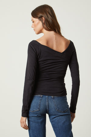 Tabbie Shirred Fitted Tee in black with blue denim back