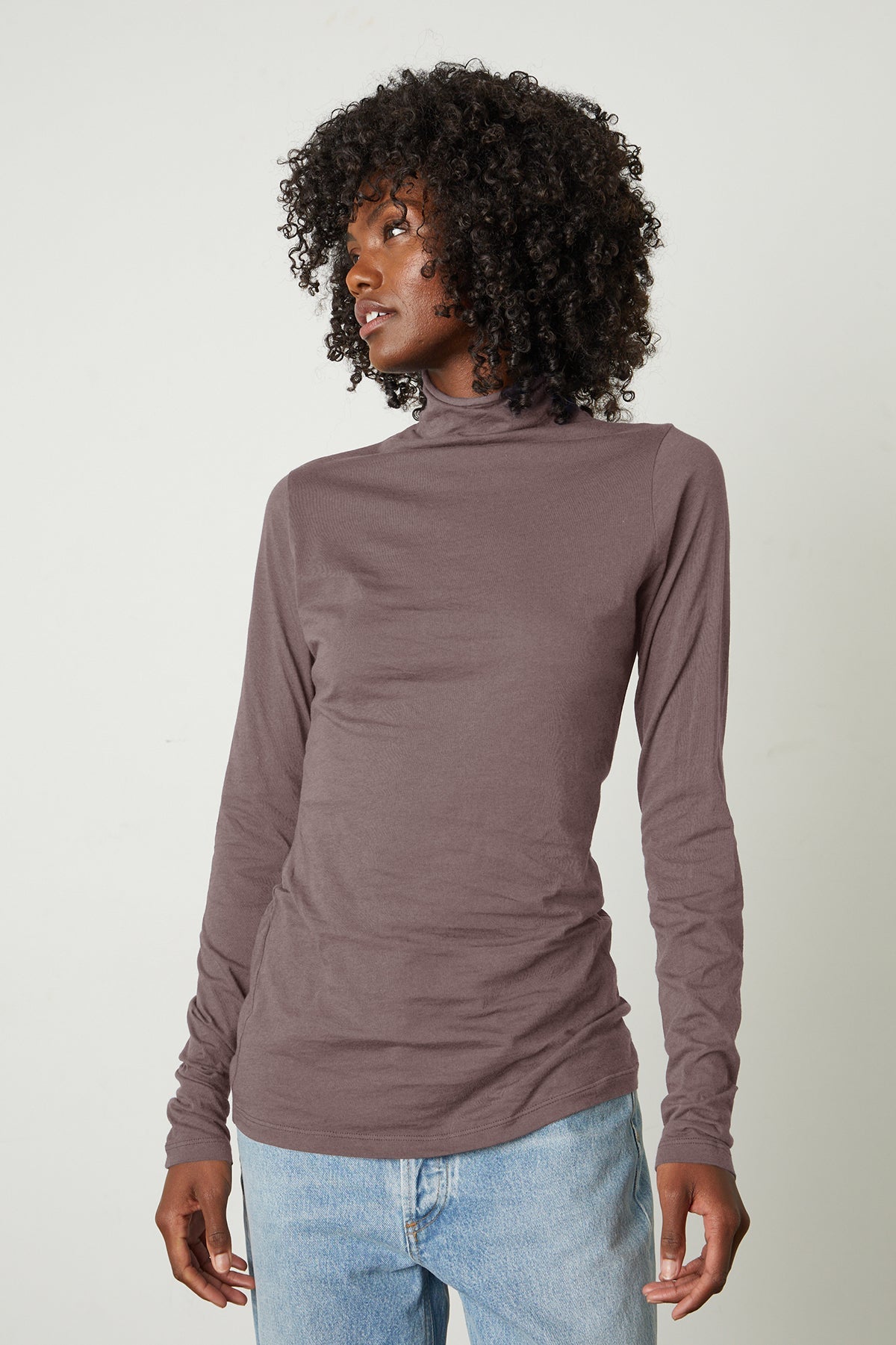   Talisia Gauzy Whisper Fitted Mock Neck Tee in Fawn with light blue denim front 