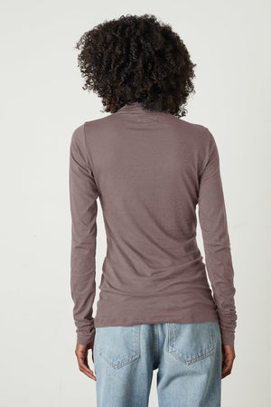 Talisia Gauzy Whisper Fitted Mock Neck Tee in Fawn with light blue denim back