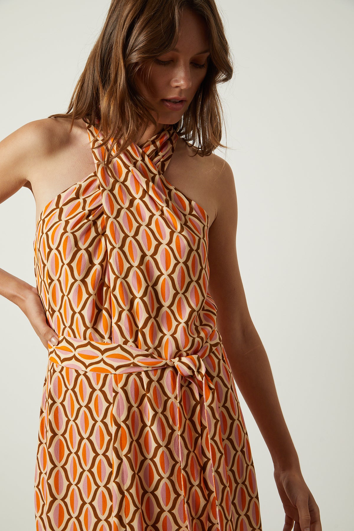   Caterina dress in orange geometric pattern close up front detail 