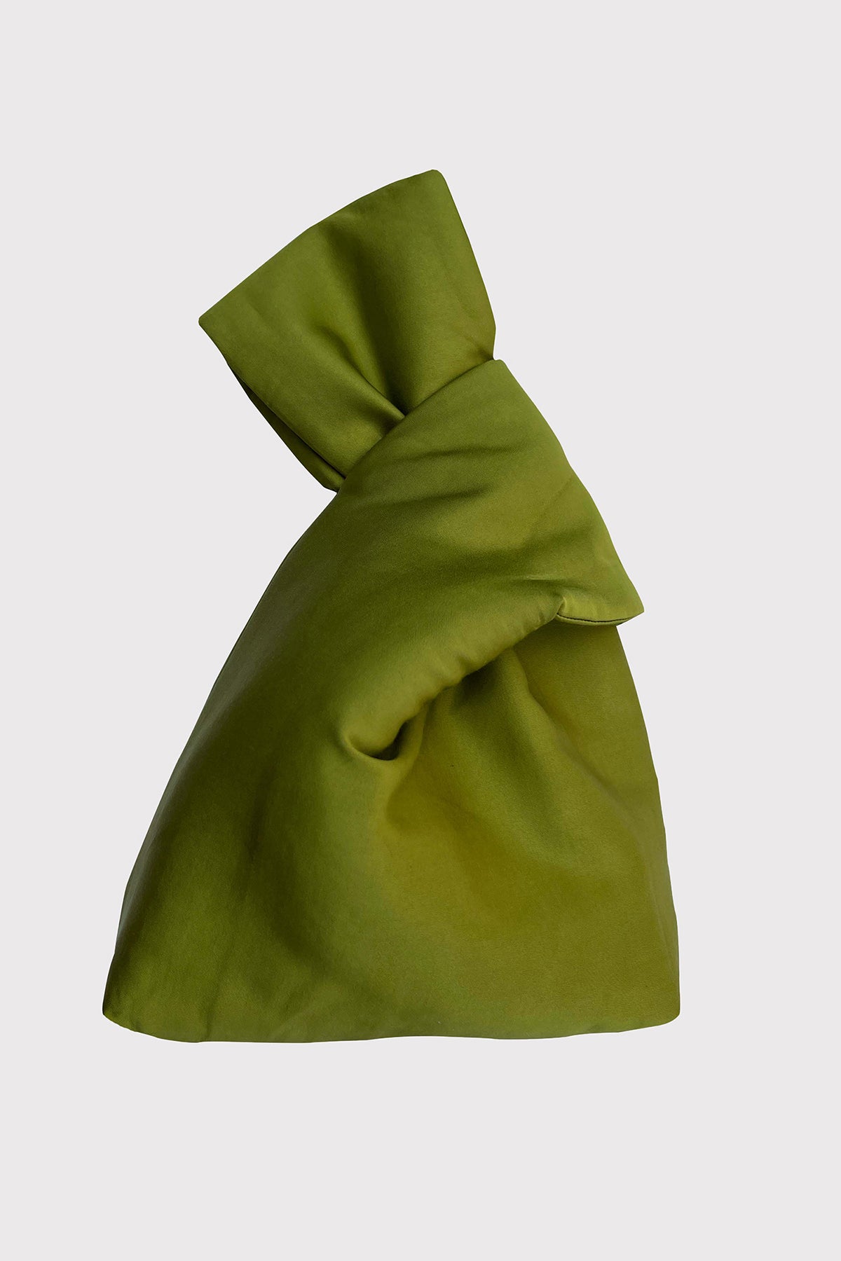   A green JENNY BAG on a white background, by Velvet by Jenny Graham. 