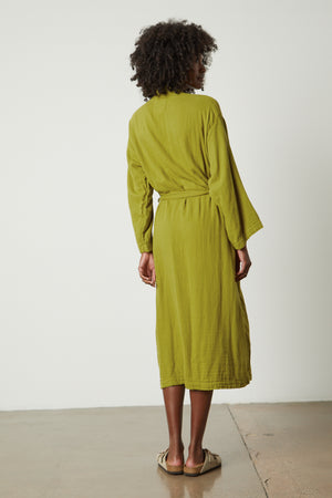 the back view of a woman wearing a Jenny Graham Home COTTON GAUZE ROBE.