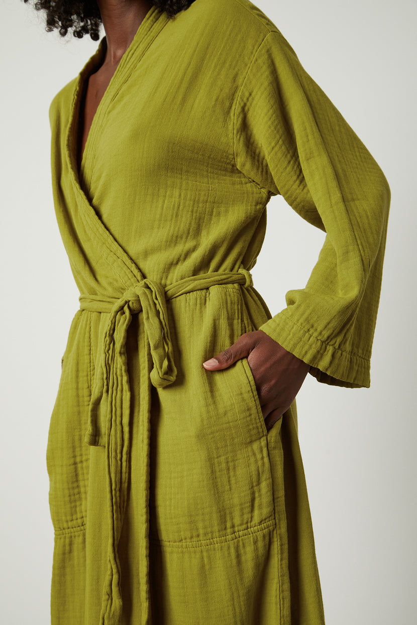 a woman wearing a Jenny Graham Home Cotton Gauze Robe.