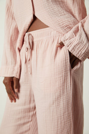 a woman wearing pink Jenny Graham Home PAJAMA PANT.