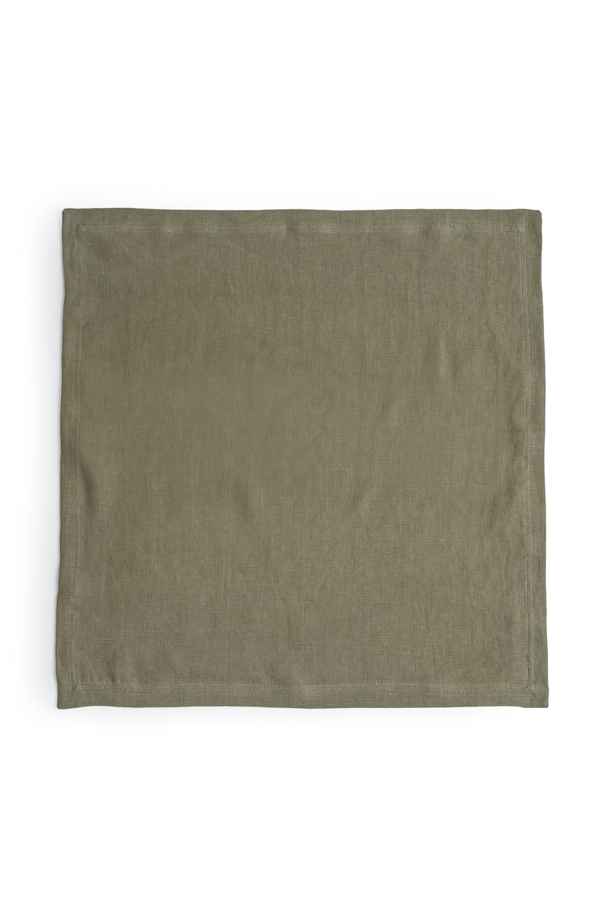   A green LINEN NAPKIN, an everyday kitchen essential, on a white background with a luxe finish from Jenny Graham Home. 