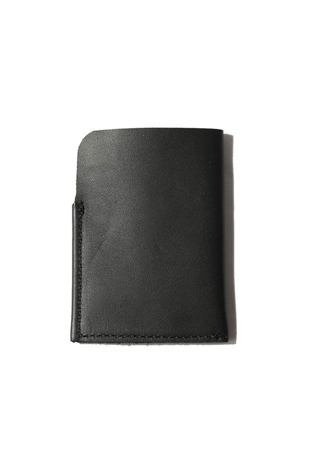   A minimalist SOFT LEATHER CARD HOLDER crafted by local artisans, showcasing the essence of our Lima Sagrada brand. 
