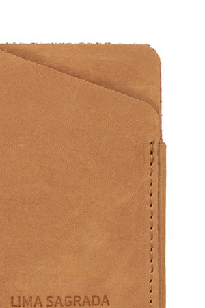 A SOFT LEATHER CARD HOLDER BY LIMA SAGRADA branded wallet with the word lima sagrada on it.