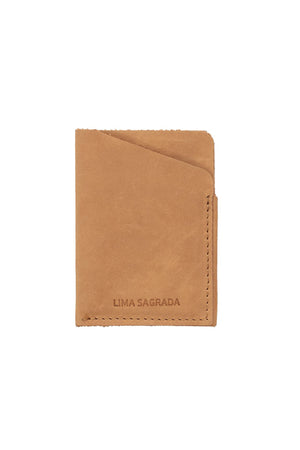A SOFT LEATHER CARD HOLDER BY LIMA SAGRADA by local artisans with the word ema sagara on it.