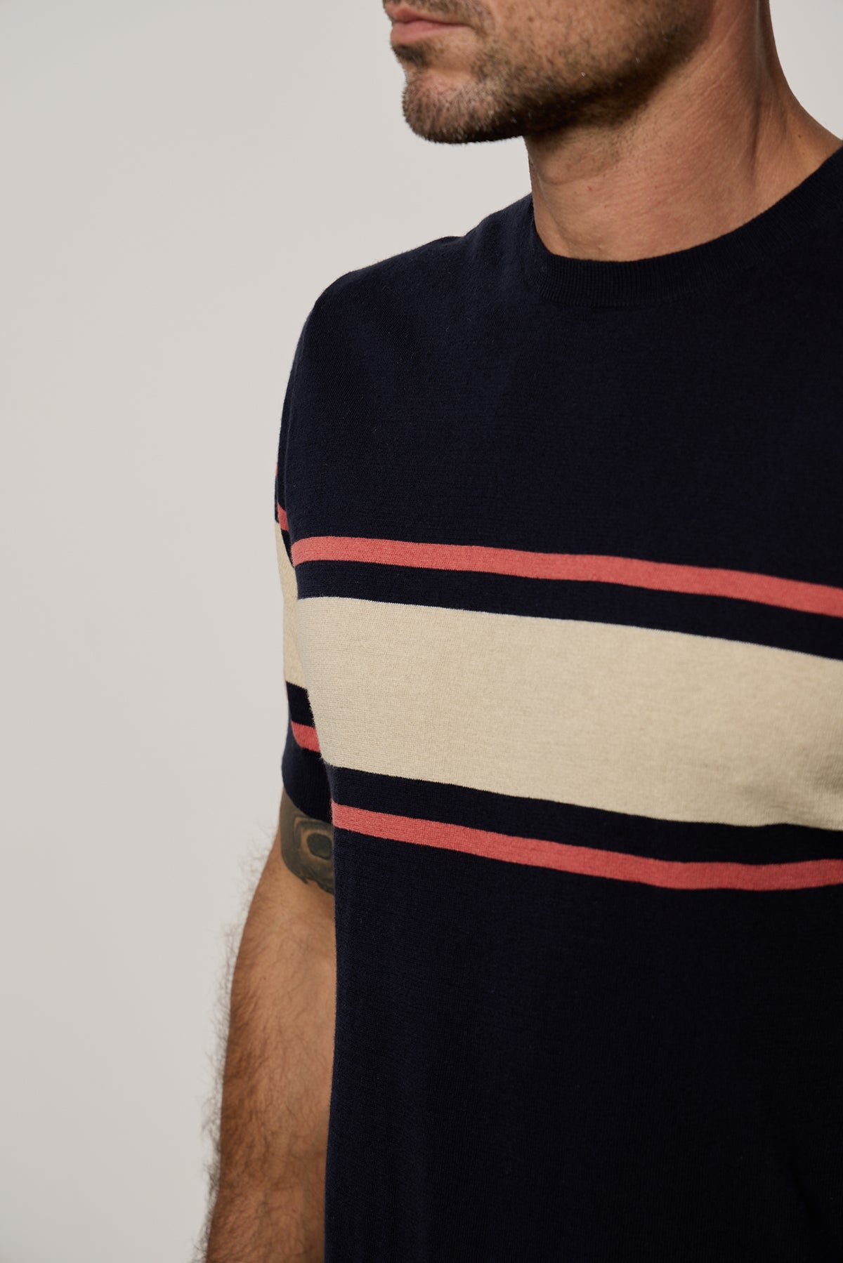   A man wearing the Velvet by Graham & Spencer Dexter Linen Blend Striped Crew t - shirt. 