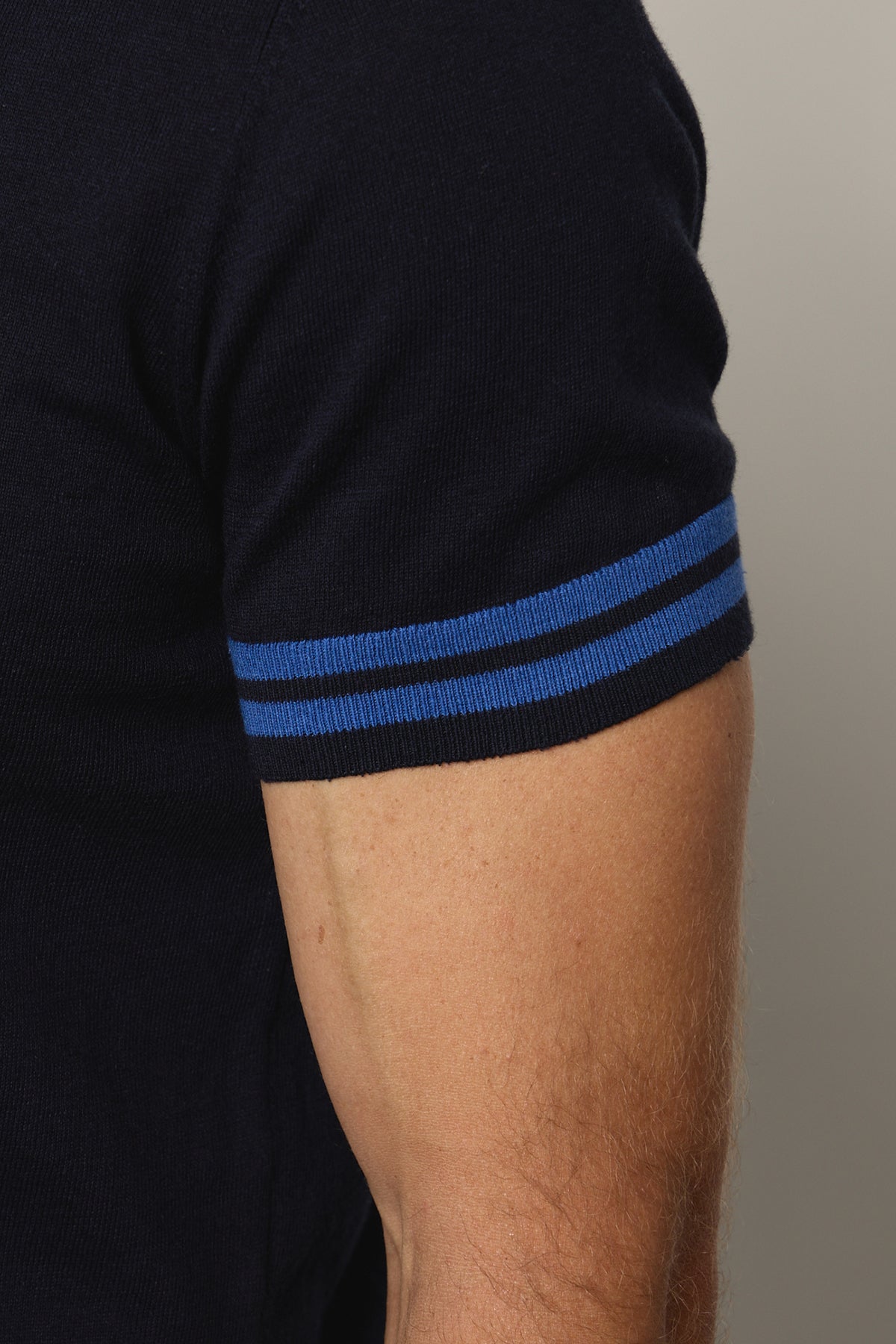   Hogan Polo in navy linen blend detail of double stripe on sleeve trim 