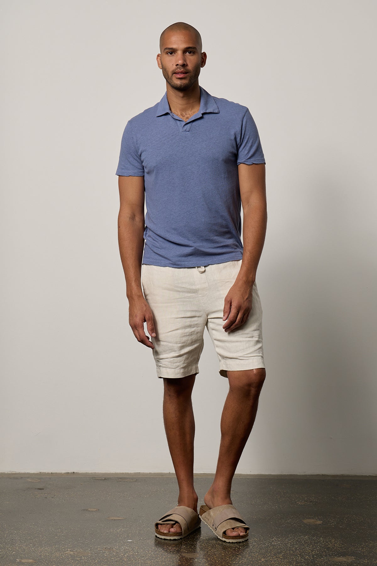 Beck Linen Blend Polo in marine blue, linen shorts and Birkenstocks full length front-26249456058561