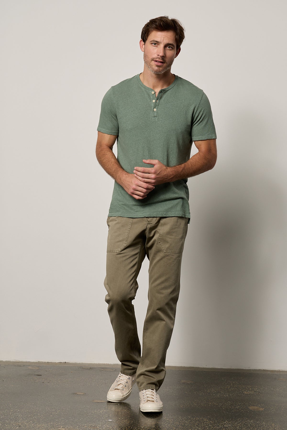   Man wearing Lionel Henley in fern green full length front with Ralph pants in axe 