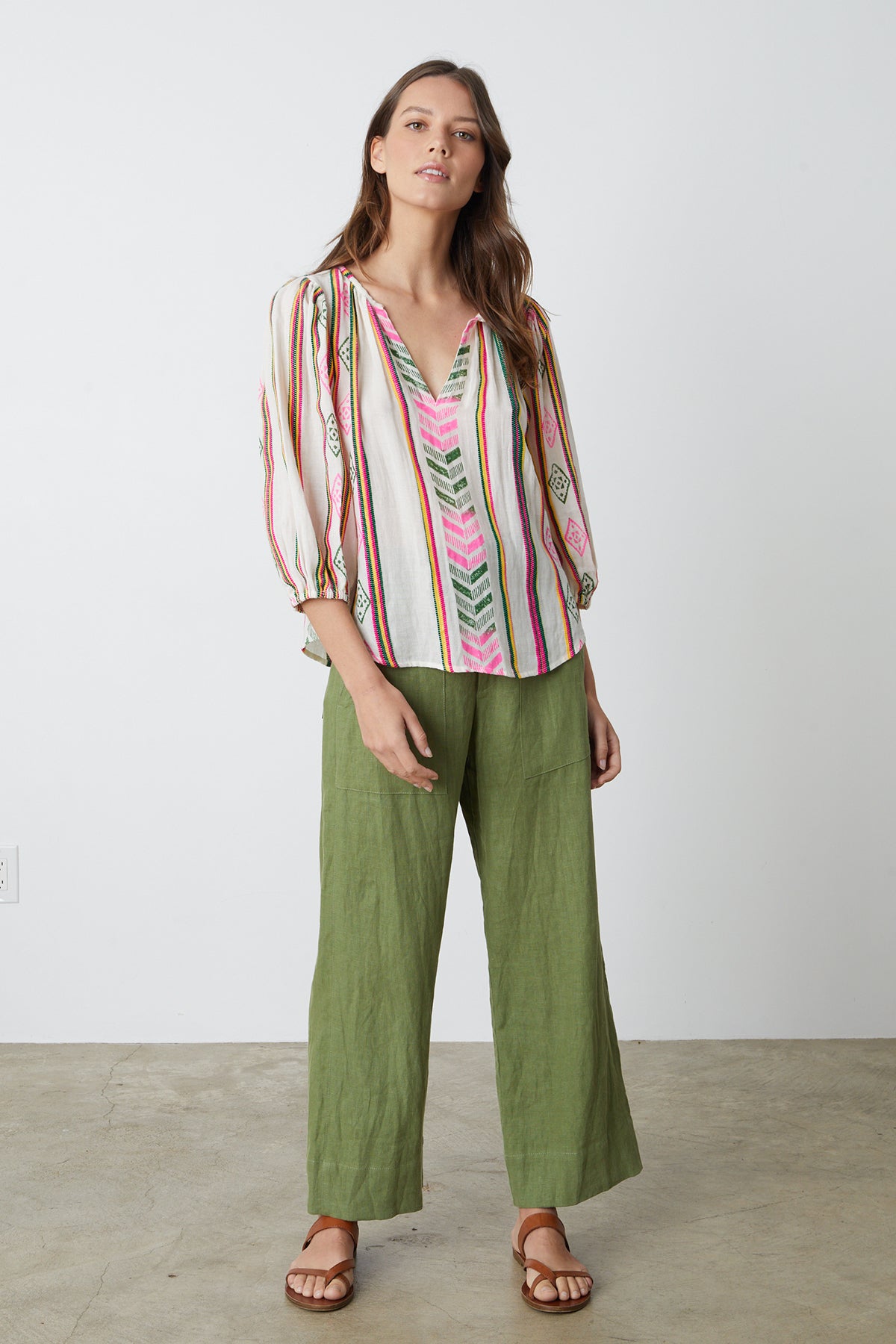   Beth Boho Top in multi colored jacquard print with Dru pant in basil green full length front 