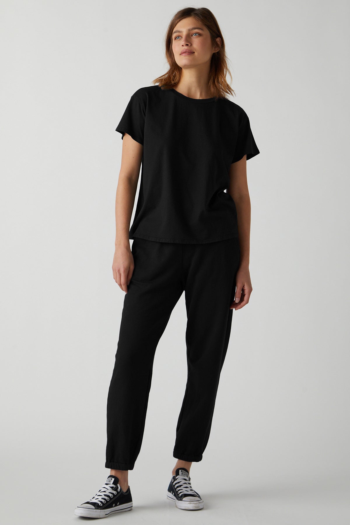 Topanga Tee in black with Zuma Sweatpant full length front with black Converse-26040999182529