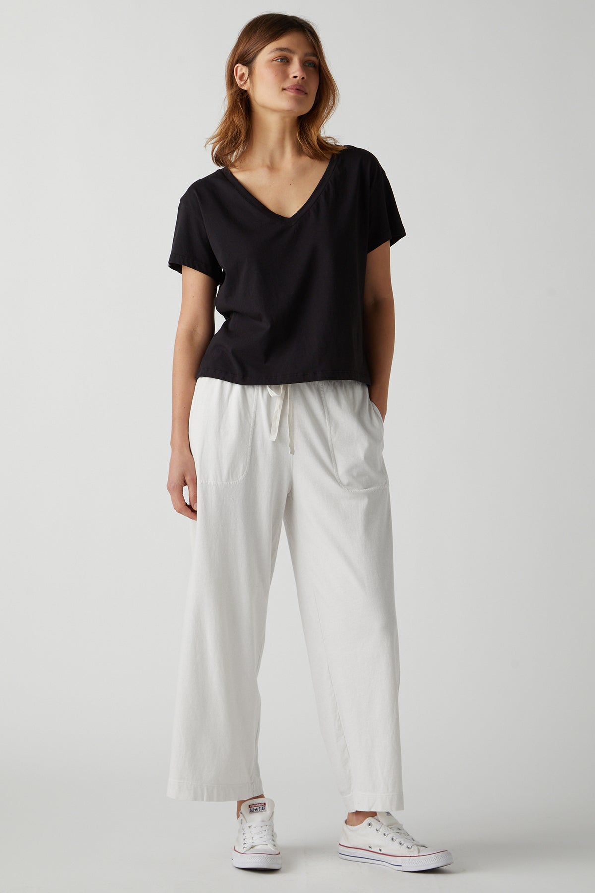   a woman wearing a black t- shirt and Velvet by Jenny Graham PISMO PANT. 