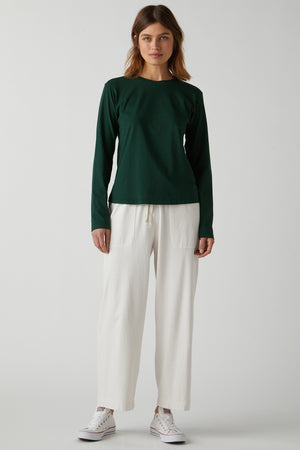 Vicente Tee in forest green with Pismo Pant in beach full length front